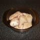 Sealed chicken pieces are added to casserole dish