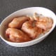 Dry marinade is rubbed in to the chicken portions