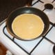 Eggs are added to pan for omelette