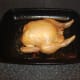 Roast chicken is cooked and ready to be rested