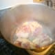 Braise the chicken thighs in a small amount of oil. Once braised, remove the chicken and cook the onions in the same pot. Add the broth mixture.