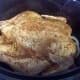 Place chicken on top of onion slices in crockpot.