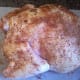 Rub spices on inside and outside of chicken.
