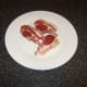 Three small lamb chops per person are casseroled