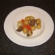 Vegetables are plated first when serving casserole
