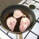 Chicken thighs are quickly browned and sealed