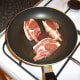 Lamb chops are browned on both sides