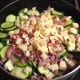 Add the ingredients to the zucchini