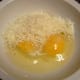 In a small bowl add the eggs, salt, pepper, and Parmesan cheese
