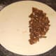 Beef is torn and laid on pastry