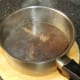 Beef stock is added to the beef