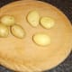 Potatoes are carefully peeled for roasting