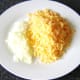 Cheese is grated and onion finely chopped