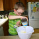 My four-year-old adds sweetened condensed milk to the cream cheese.