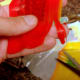 Cut small strips in the fruit roll ups to make the tassel for the graduation caps.