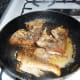Cooking the fish.