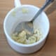 Preparing garlic sauce.