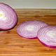 Sliced red onion rings.