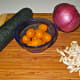 Cucumber, tomatoes, red onion and sliced almonds are great salad ingredients.