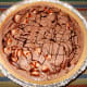 Place the pie on an even surface in the freezer for a minimum of one hour. Cover with freezer wrap if freezing for a longer period.