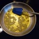 Cook garlic until it is just golden colored.