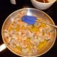 Saute the shrimp, then add spice and sherry mixture.