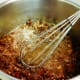 Dates, sugar and water placed into stovetop pan