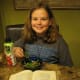 Sophie eating her own recipe: Green Beans with Turkey Bacon! She makes these almost every night for us!