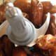 Place 1 1/2 cups of pitted dates in a food processor.