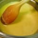 Cooking the mixture until it thickens
