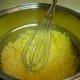 Egg yolks in double boiler with salt, milk and sugar