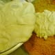 Spooning the batter into the cornflake crusted springform pan