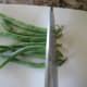 Chop or snap the stems and ends off of the beans. You may also snap the beans in half, or leave them whole if you prefer.