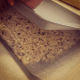Use a second cookie sheet to help flatten the mixture.
