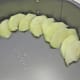 If desired, layer slices into the pan in a decorative manner.