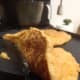 When the bottoms of the pancakes look golden, they are ready to be flipped.