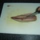 Removing the bones from a mackerel fillet