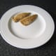 Mackerel fillets are plated for service