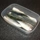 Mackerel fillets not for immediate use should be stored in a plastic container in the refrigerator