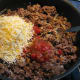 Add in shredded cheese and salsa.