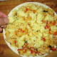 Put thinly sliced cheese on the tortilla, then put filling, then thinly sliced cheese once again
