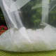 Add the ice cream salt and ice to the larger bag.