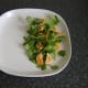 Watercress and satsuma segmnets are plated