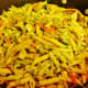 Stir in the cooked penne pasta, stir, and this dish is ready to serve.