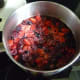 Cook the berries over medium heat until they become soft.