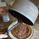 Pour the pudding into the pie crust.