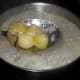 You can see here that the skins slide off the fruit while it cooks.