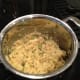6. Once sauce is thick and creamy, mix in lemon juice, Worcestershire sauce, green pepper, onion, bread crumbs, salt and pepper.