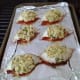 8. Using a small spoon, stuff shells loosely with crab mixture.