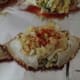 9. Sprinkle each crab with paprika.